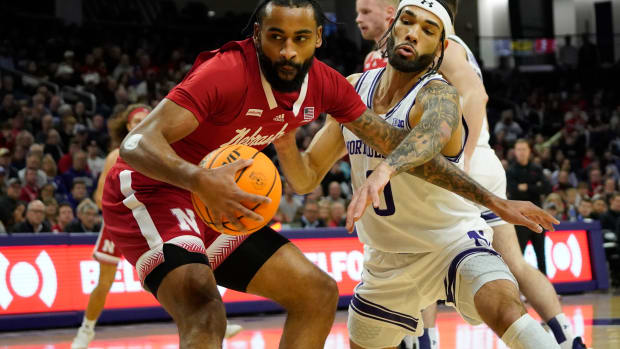 Feb. 7, 2024; Evanston, Illinois, USA; Northwestern Wildcats guard Boo Buie (0) defends Nebraska Cornhuskers guard Brice Williams (3) during the first half at Welsh-Ryan Arena.